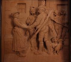 Wood carving ’The hunters’ Farewell’